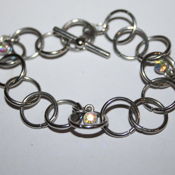 Beautiful silver link bracelet with dangling AB rhinestone charms 7" tog… - Picture 1 of 3